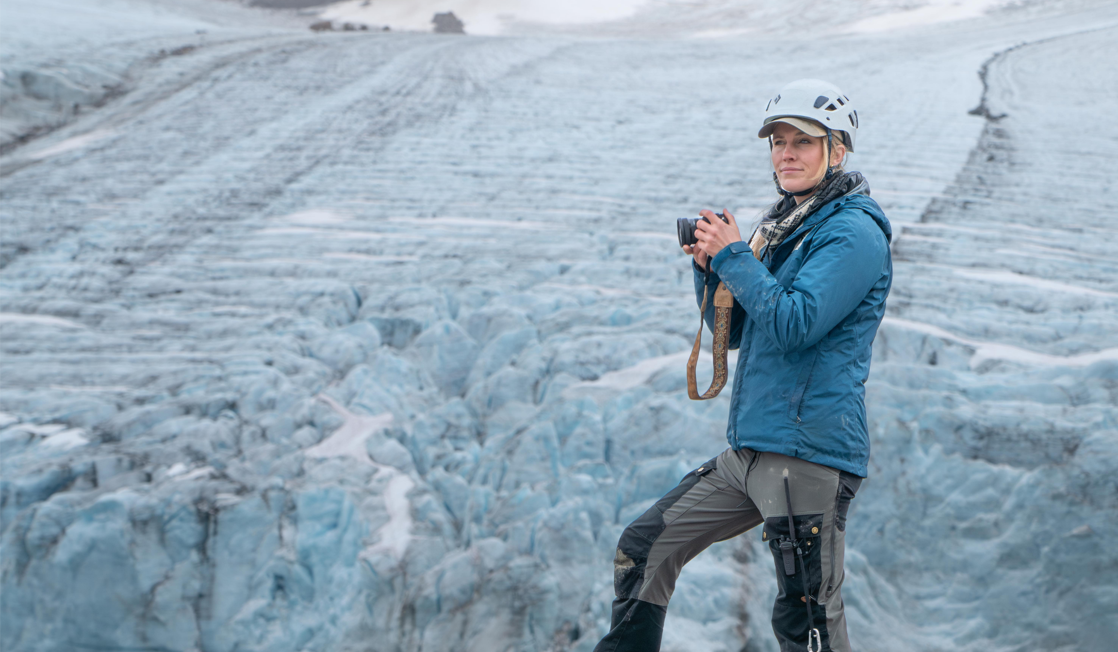 A guide and traveler discussing conservation during a sustainable travel trip. 
