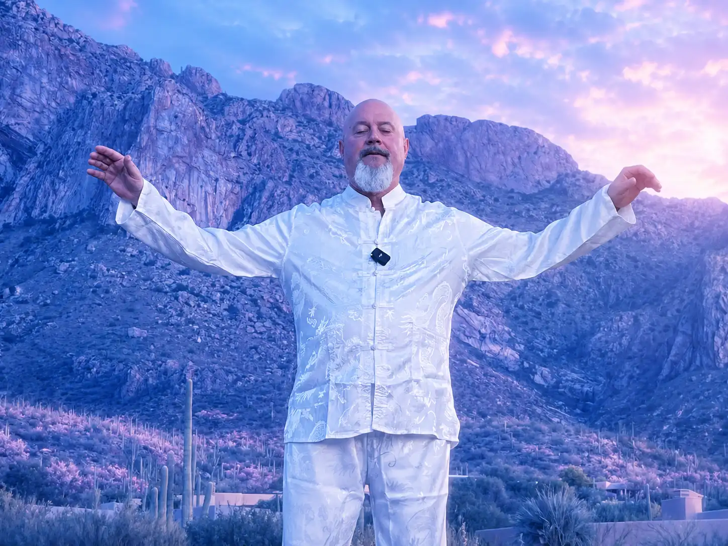 Master Lama Rasaji leads a Tai Chi Gung class on the beach