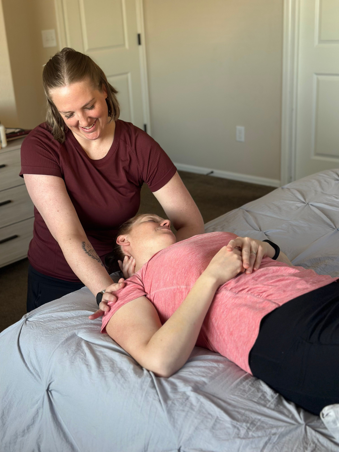 Occupational Therapist is seen performing interventions by using manipulation techniques around neck and shoulders. 