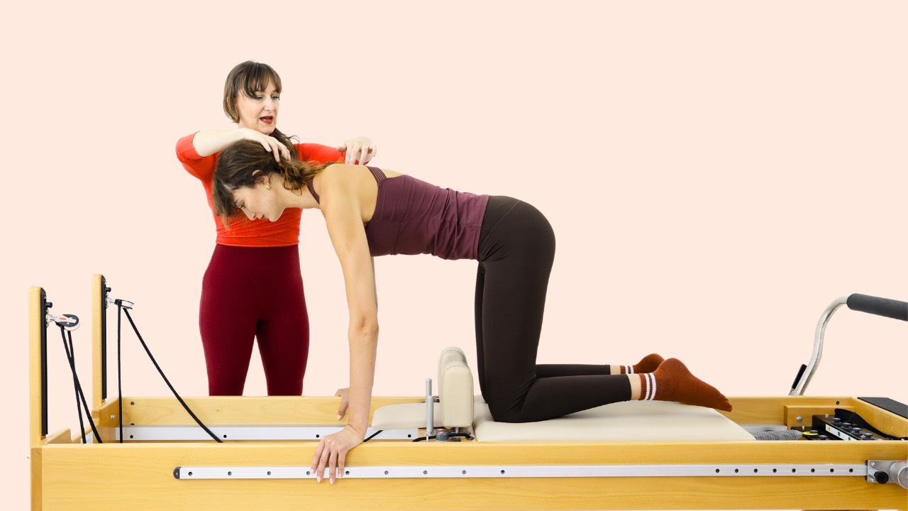 Louise Taube teaching reverse abdominal on the Pilates Reformer