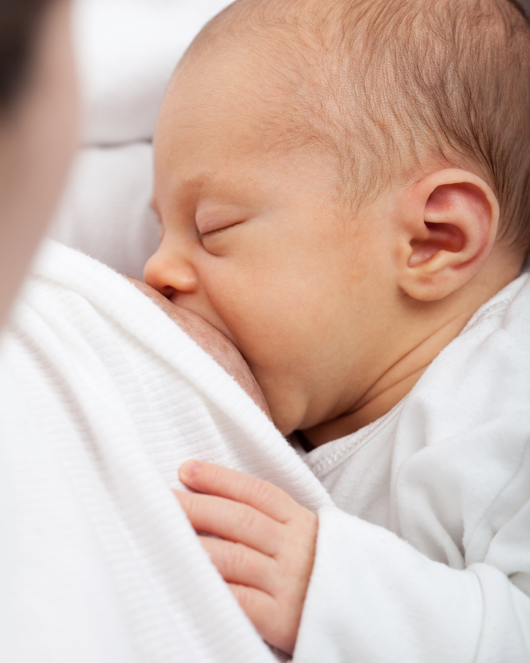 new mom getting in-home personalized breastfeeding help from lactation consultant in West Omaha