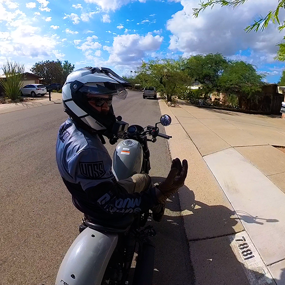 Biker on a motorcycle riding on the road