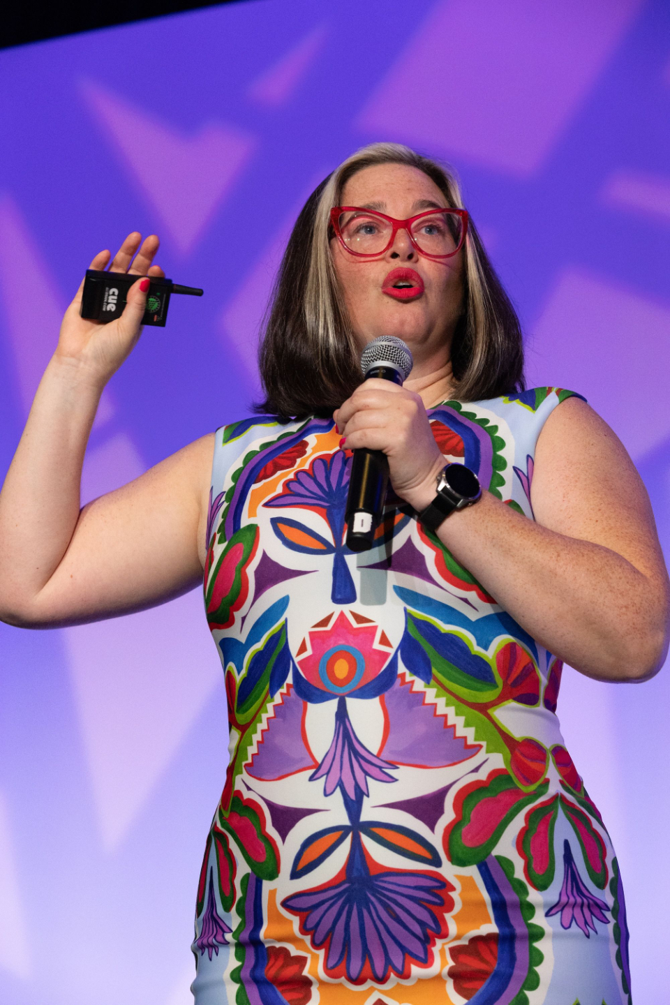 Cait Donovan speaking on stage