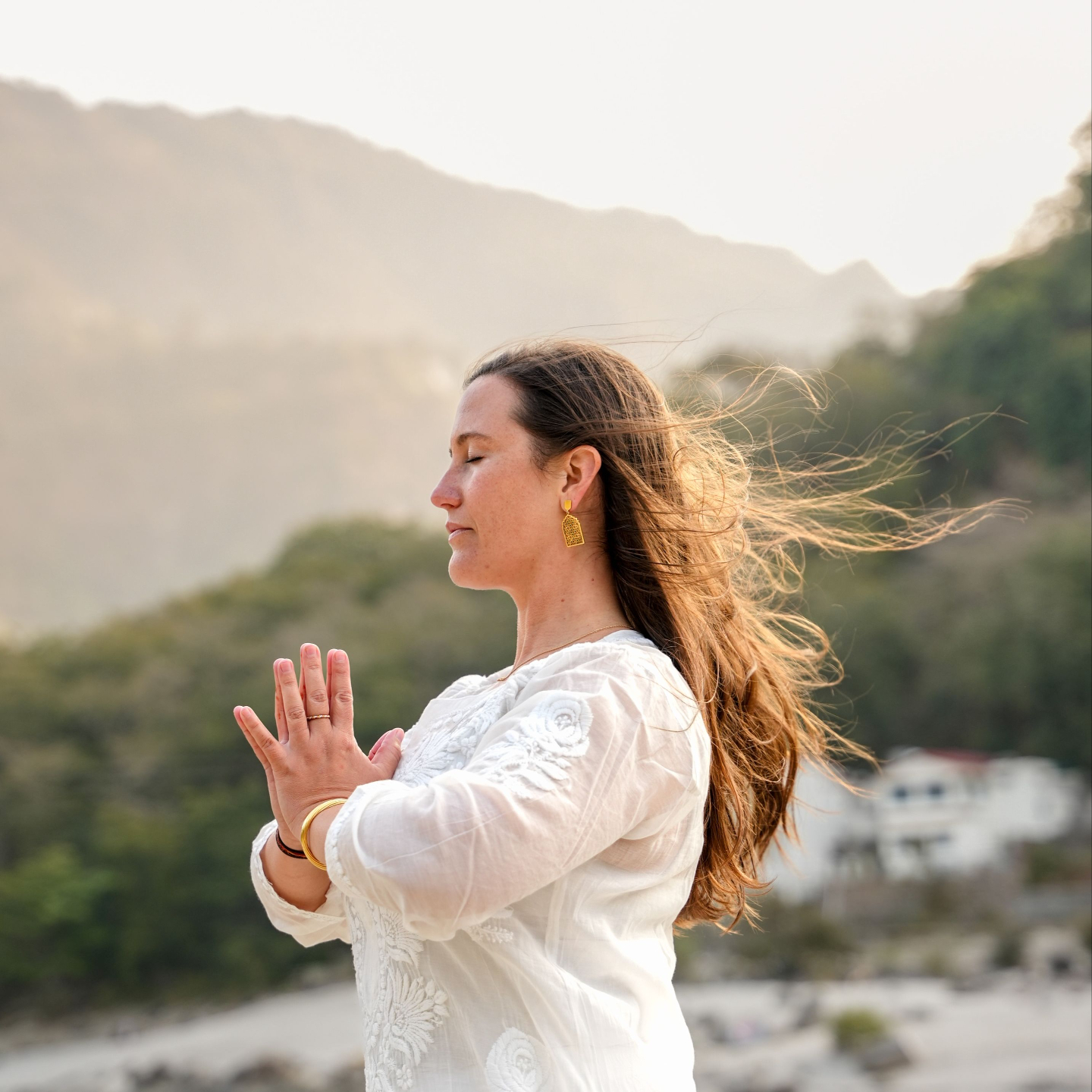 Cat Wetenkamp in goddess inspired pose in the forest