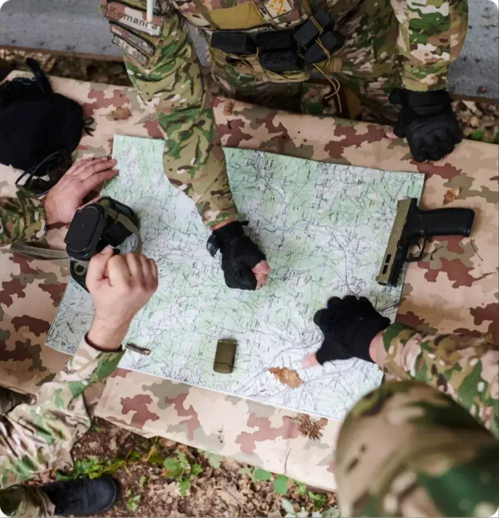 Military soldiers looking at a map