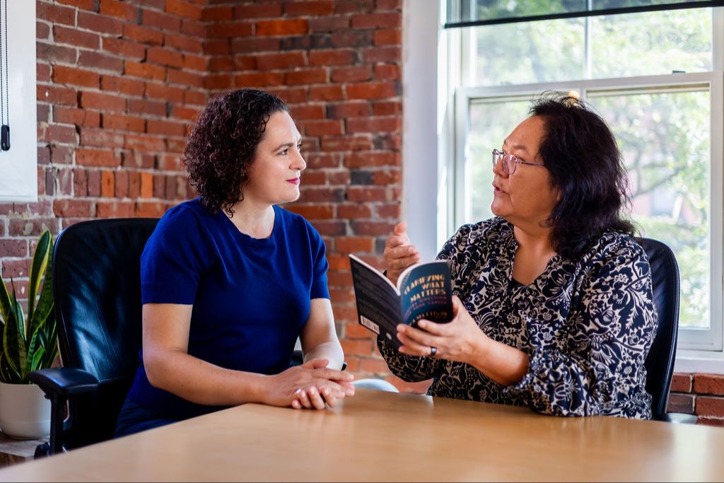 Career coach Erica Mattison in a reflective conversation with a professional exploring new career and life directions.