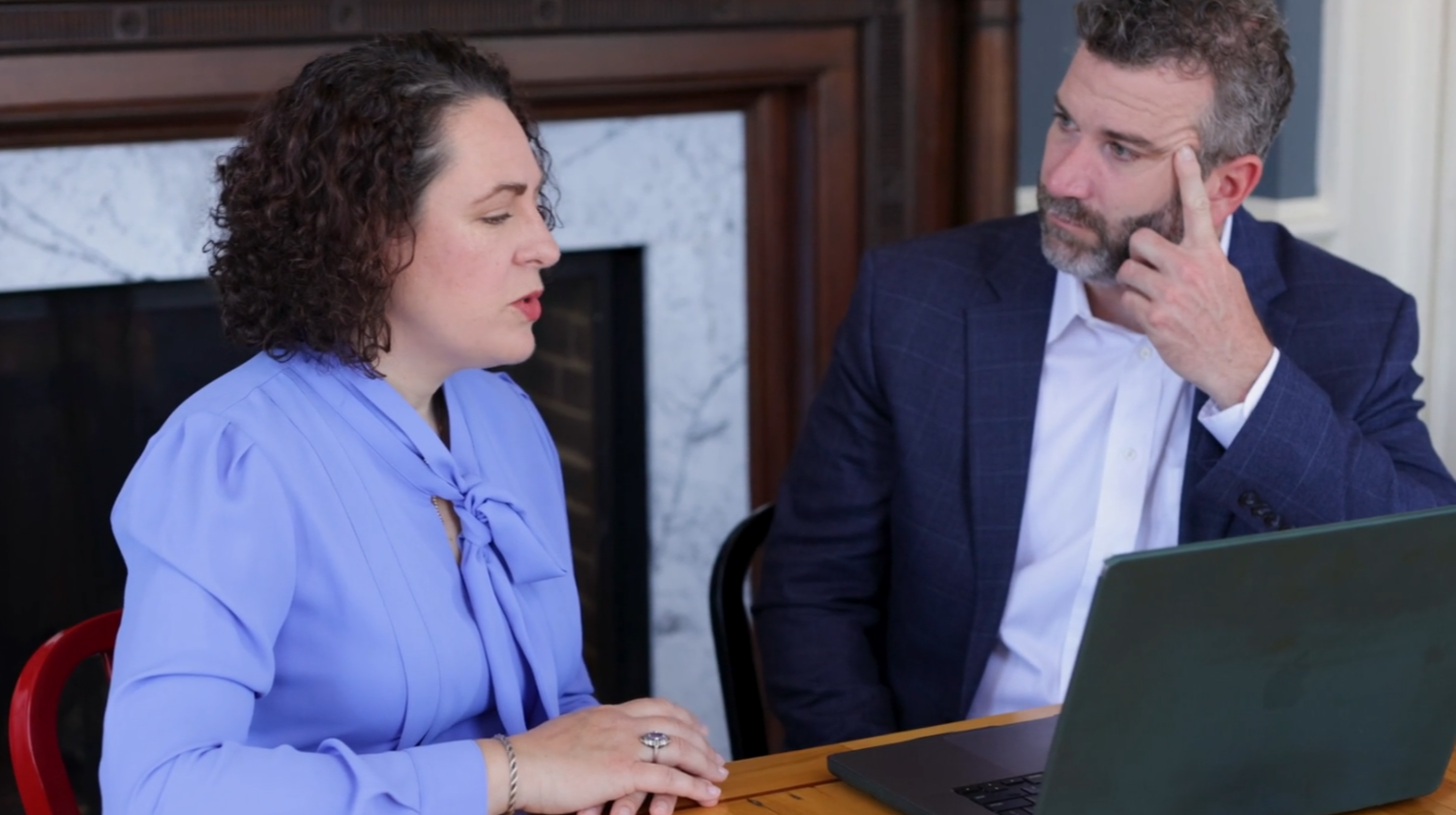 Erica speaks with a client