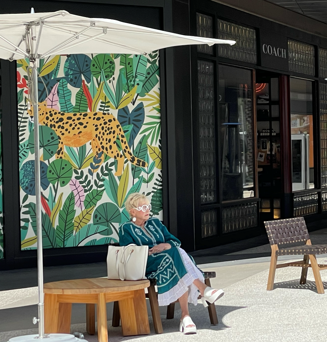 Older woman relaxing outdoors, representing balance and freedom in later life.