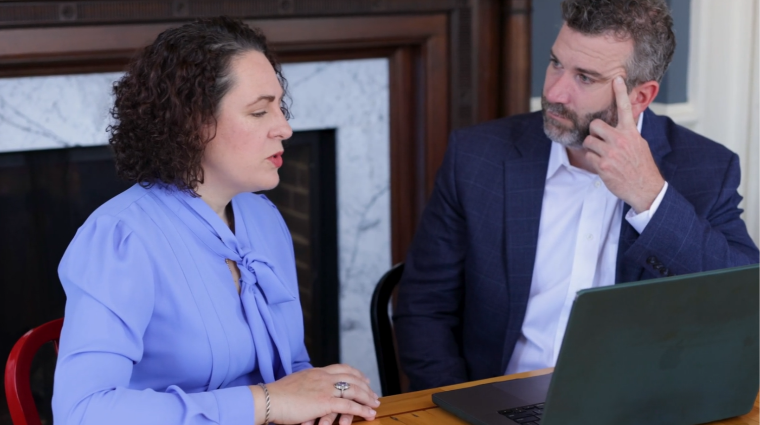 Erica meets with a client