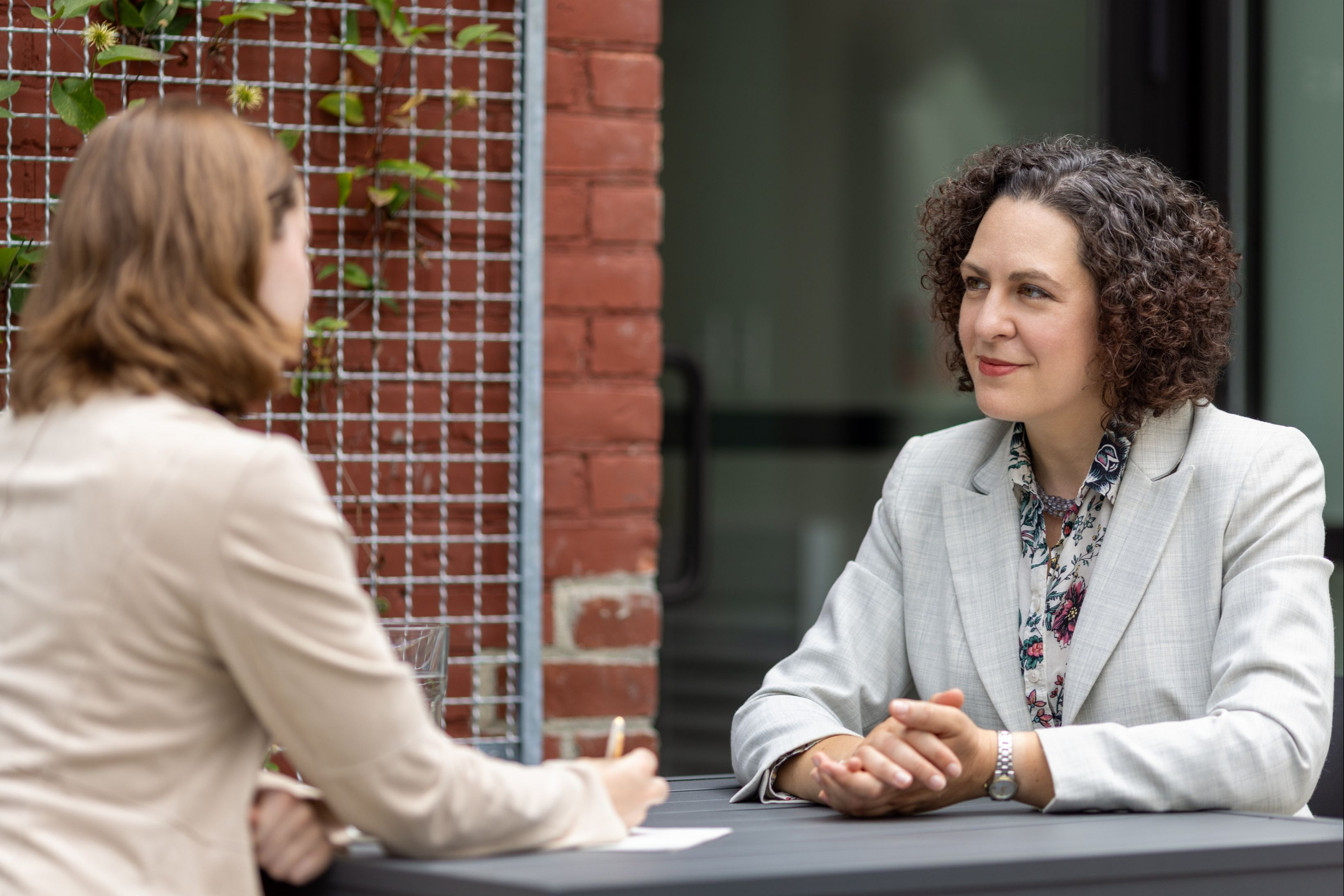 Erica meets with a client