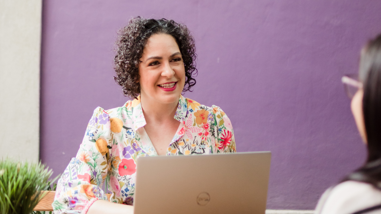 Erica meets with a client