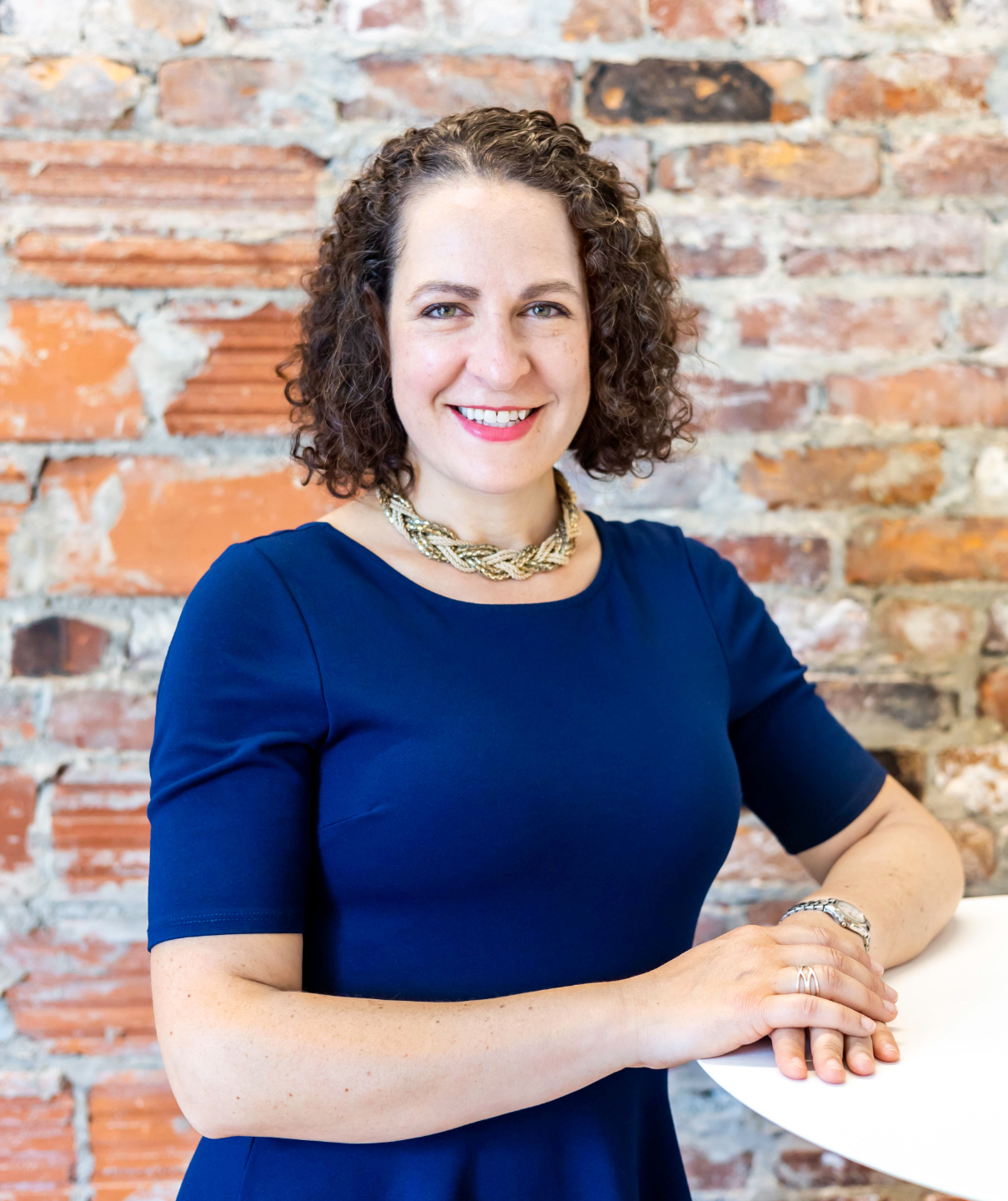 Erica Mattison, executive and career coach in the Boston area, smiling in a professional portrait