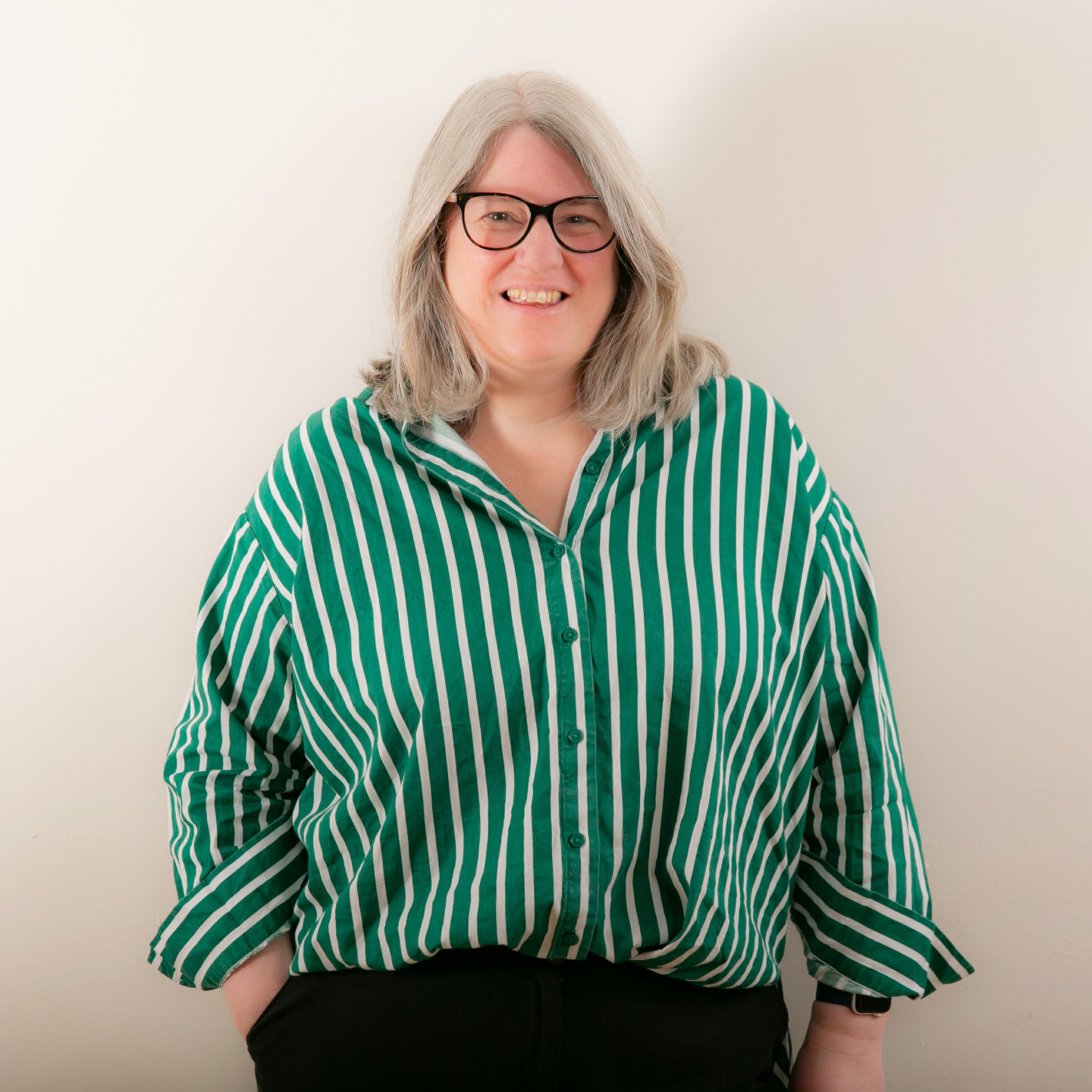 Lynsay OT supervisor in glasses looking straight at you