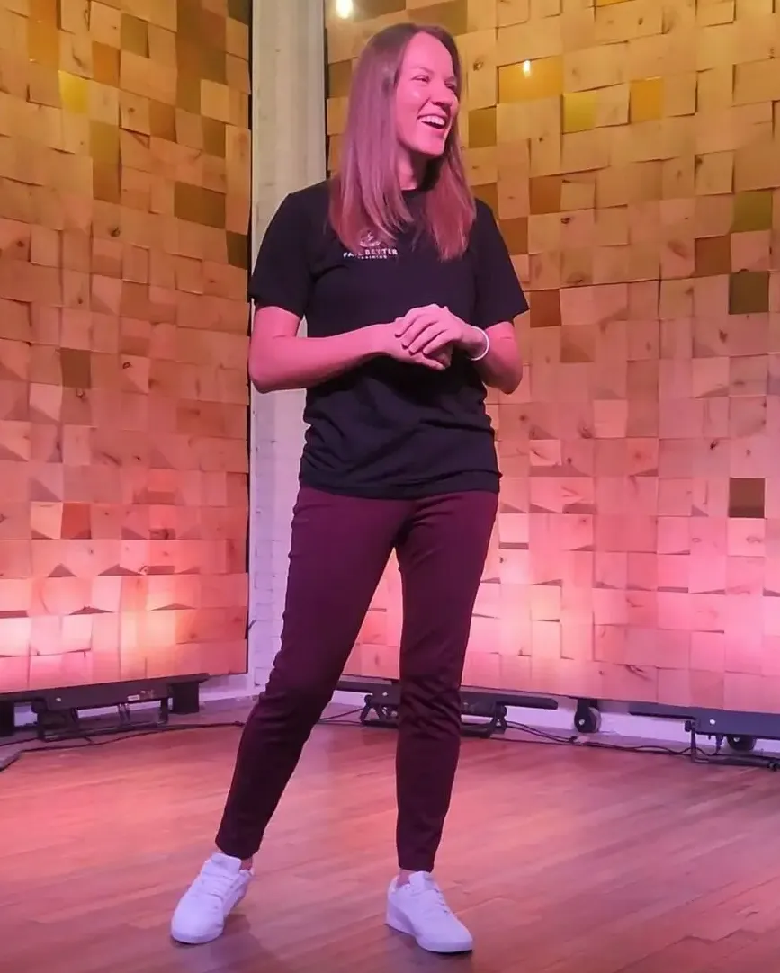 Dr. Ashley Kuchar speaking on stage