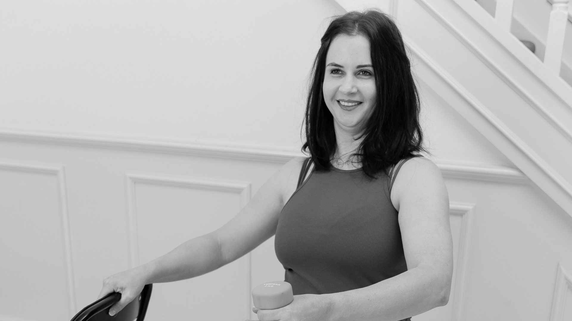 Liz Albanis senior yoga teacher yoga therapist head shot black and white