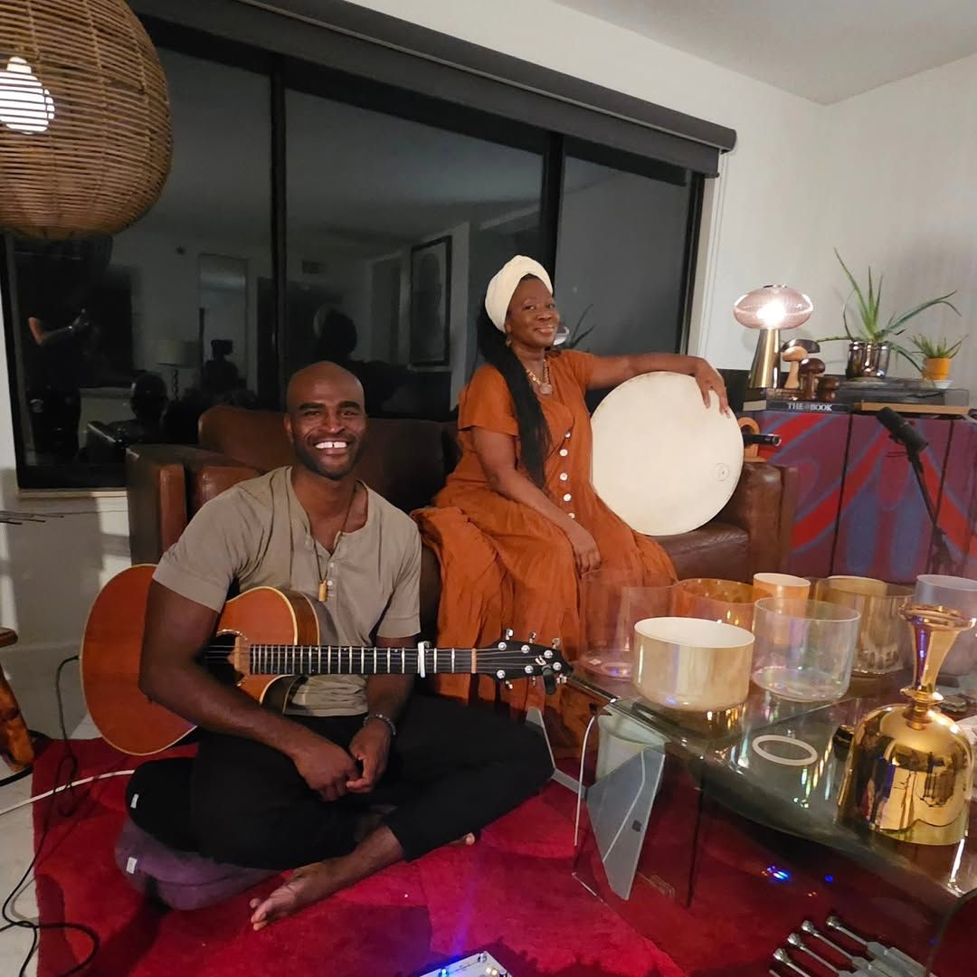 Joel performing a sound bath