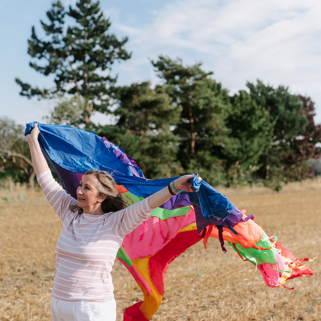 Elizabeth James holding an Ocean Sensory Parachute