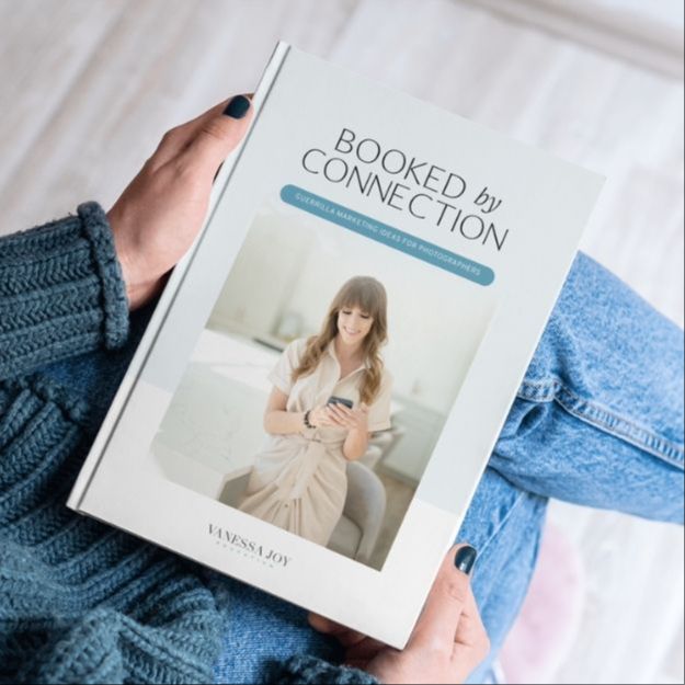 Animation showing Vanessa Joy taking photos of a couple by a beach