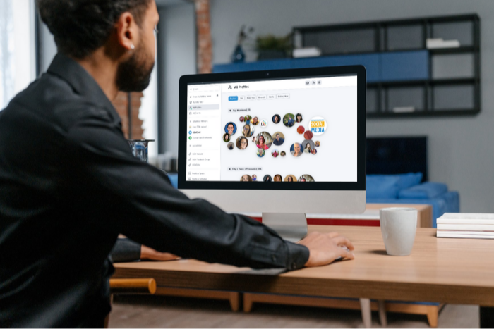 Man looking at network website on a computer