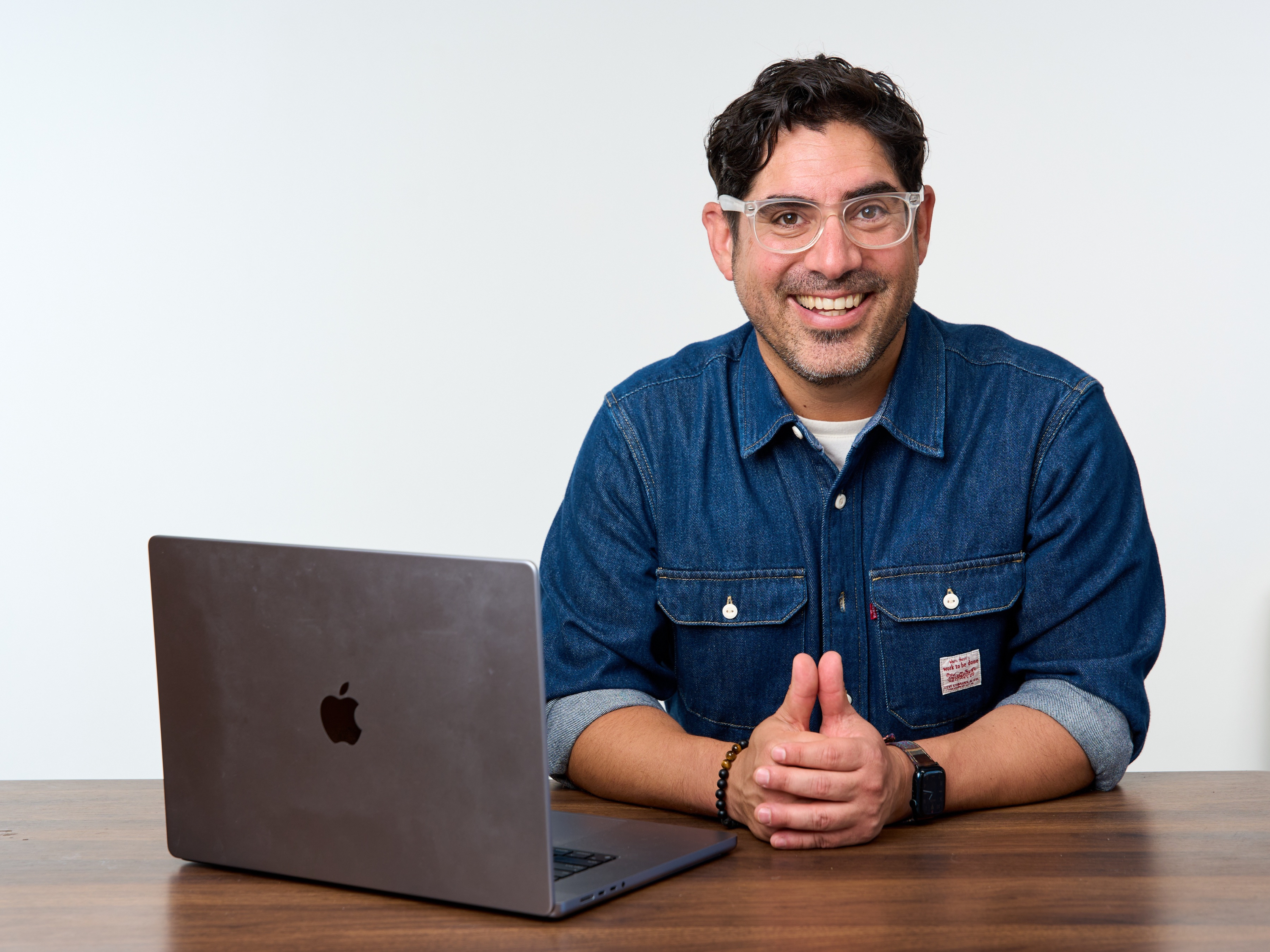 Chris Beltran at his laptop
