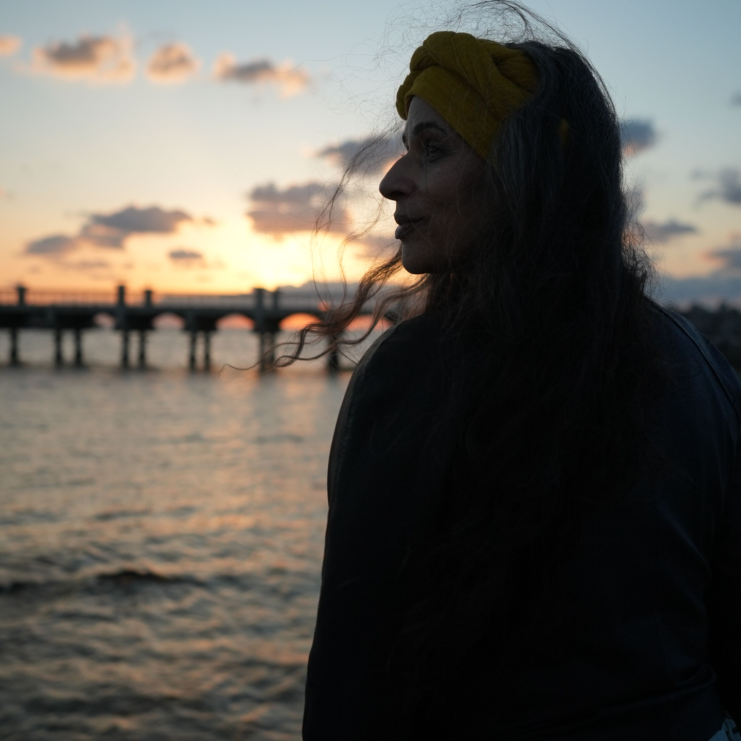 Rachel Deneé at sunset by the water