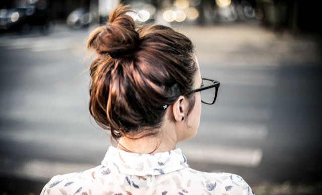 Woman with hormone imbalance, looking away 