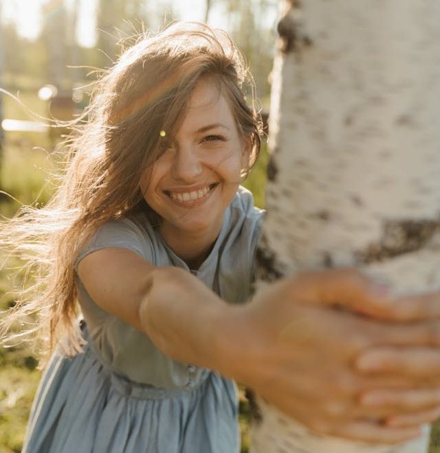 jumping happy woman at the beach 