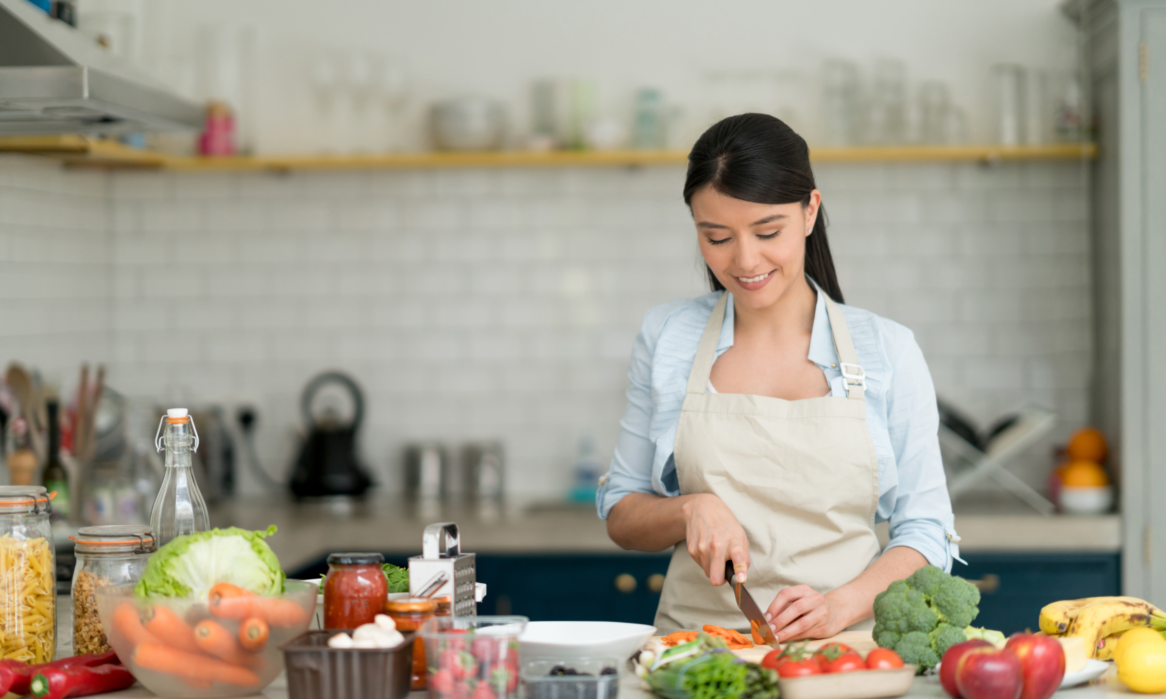 Culinary entrepreneur preparing food in her kitchen