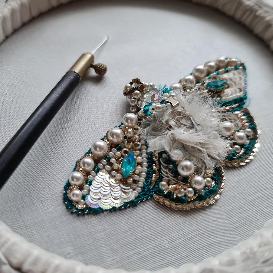 Beaded butterfly on hoop