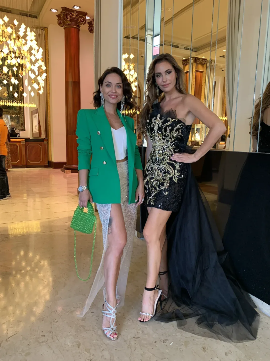 Valerija Fic with a guest at a haute couture showroom