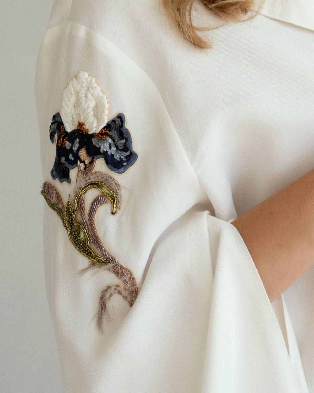 Navy floral appliqué on silk