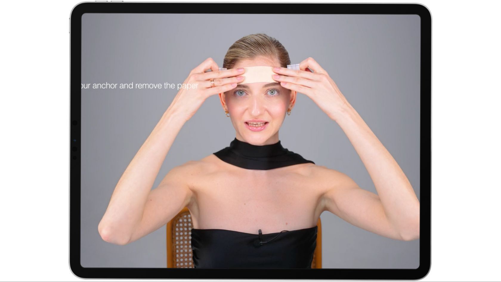 Image of Valeriia demonstrating face taping
