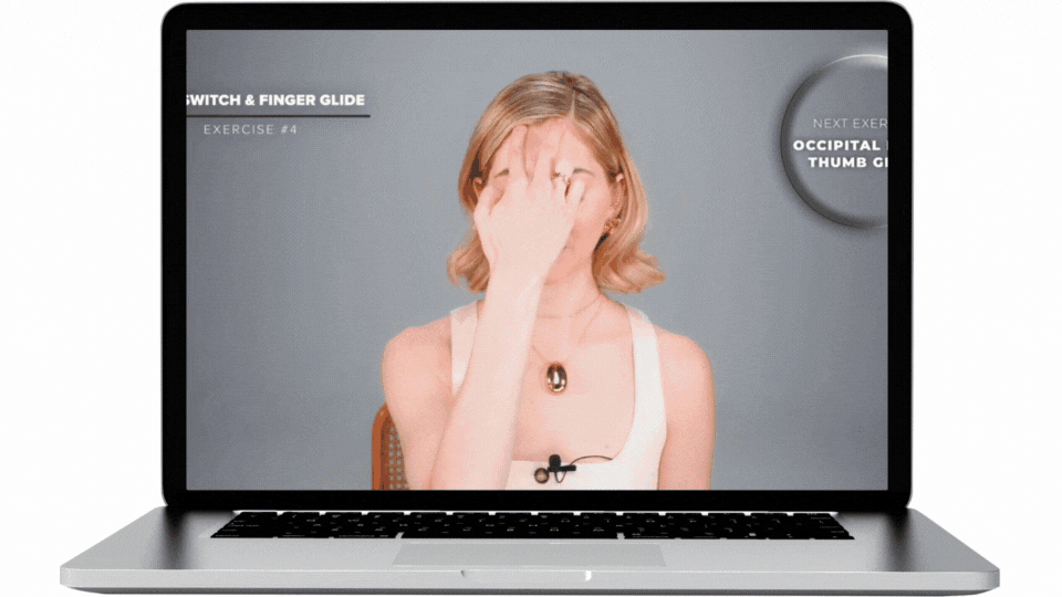 GIF of Valeriia massaging her forehead