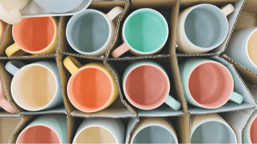 Box of handmade mugs