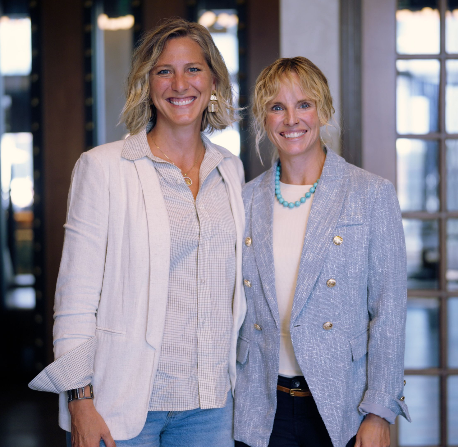 Ciara Stockeland standing with Inventory Genius client.