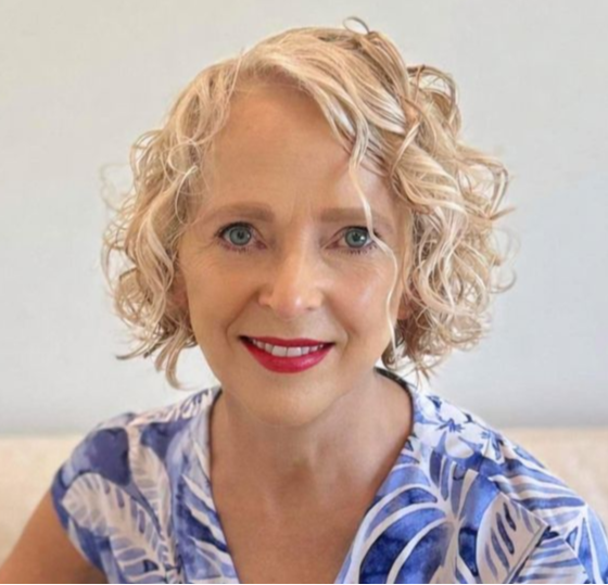 Debbie Roppo demonstrating wellness practices, guiding women over 50 to achieve vitality and age gracefully through holistic health coaching.