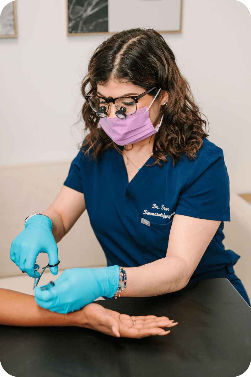 Dr. Schneider wearing her surgical loupes.