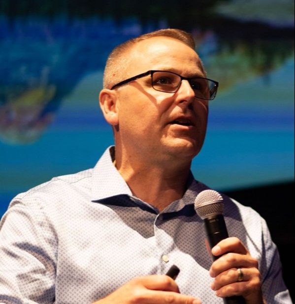 Danny Langloss speaking at a leadership summit