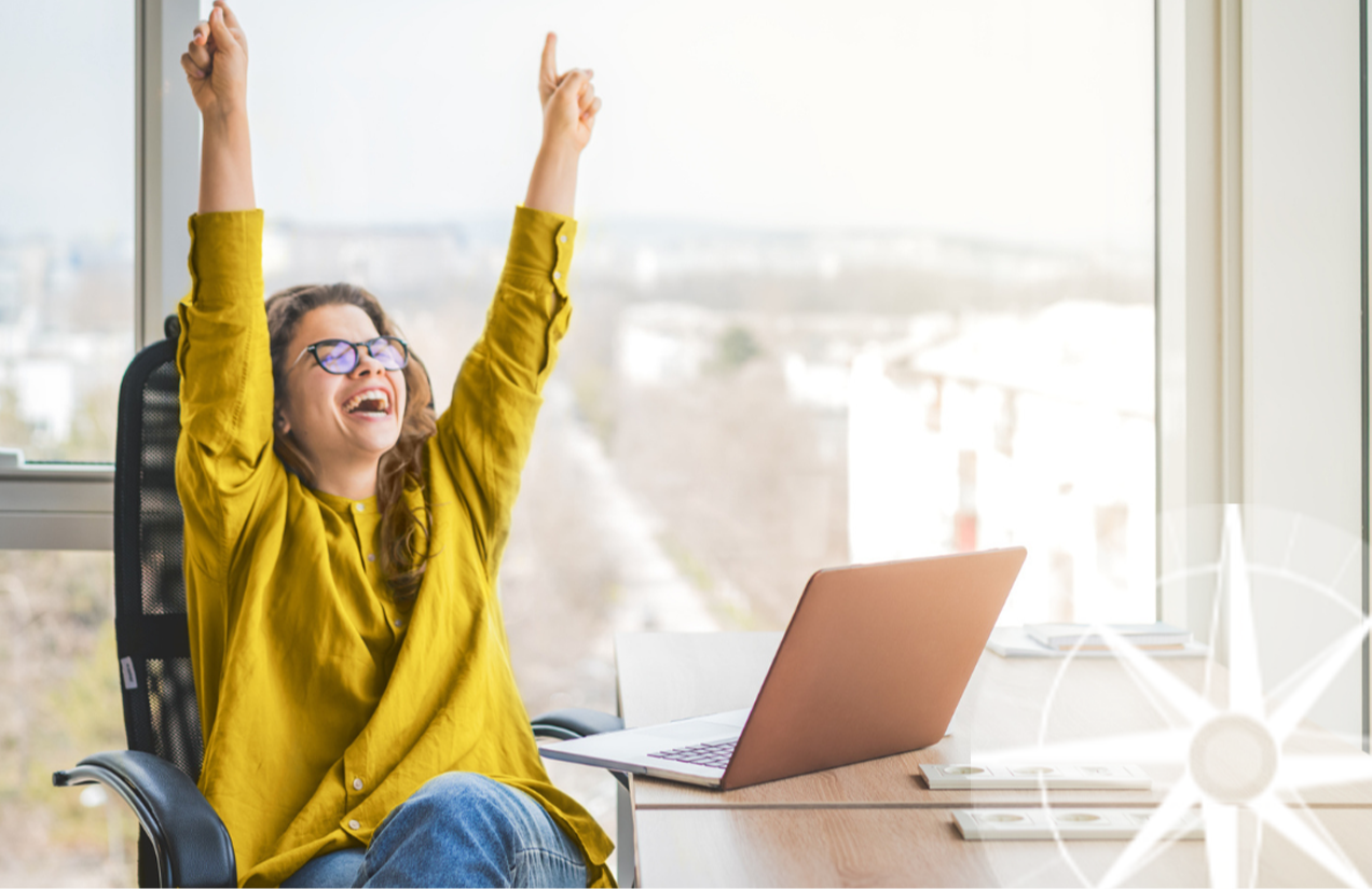 woman happy at desk