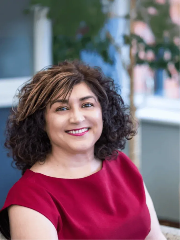 Picture of Perm Bassi, Founder of Unique Therapies, smiling at the camera. She is a Bioresonance Practioner based in the UK.