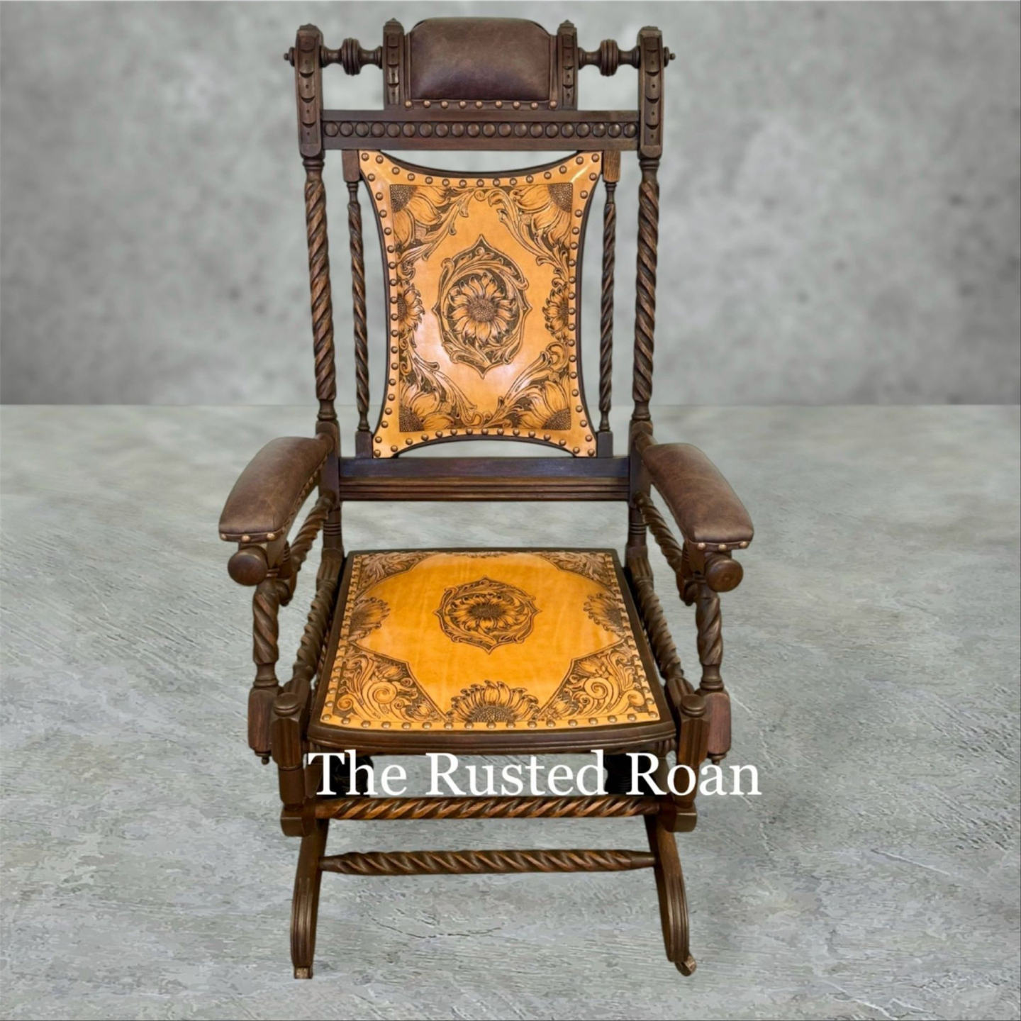 Antique rocker upholstered with tooled leather