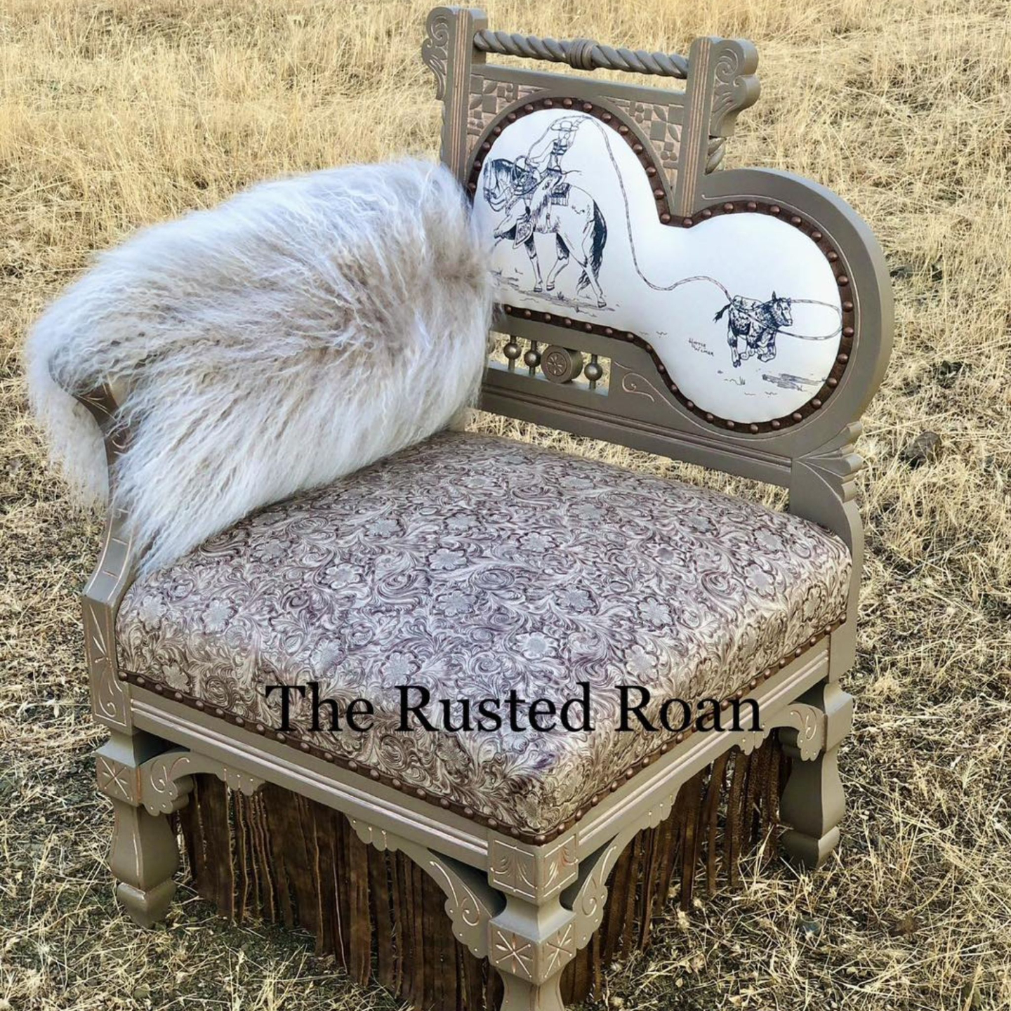 Small corner chair upholstered in embossed leather seat, lambskin arm and leather image with artwork by d.bar.d