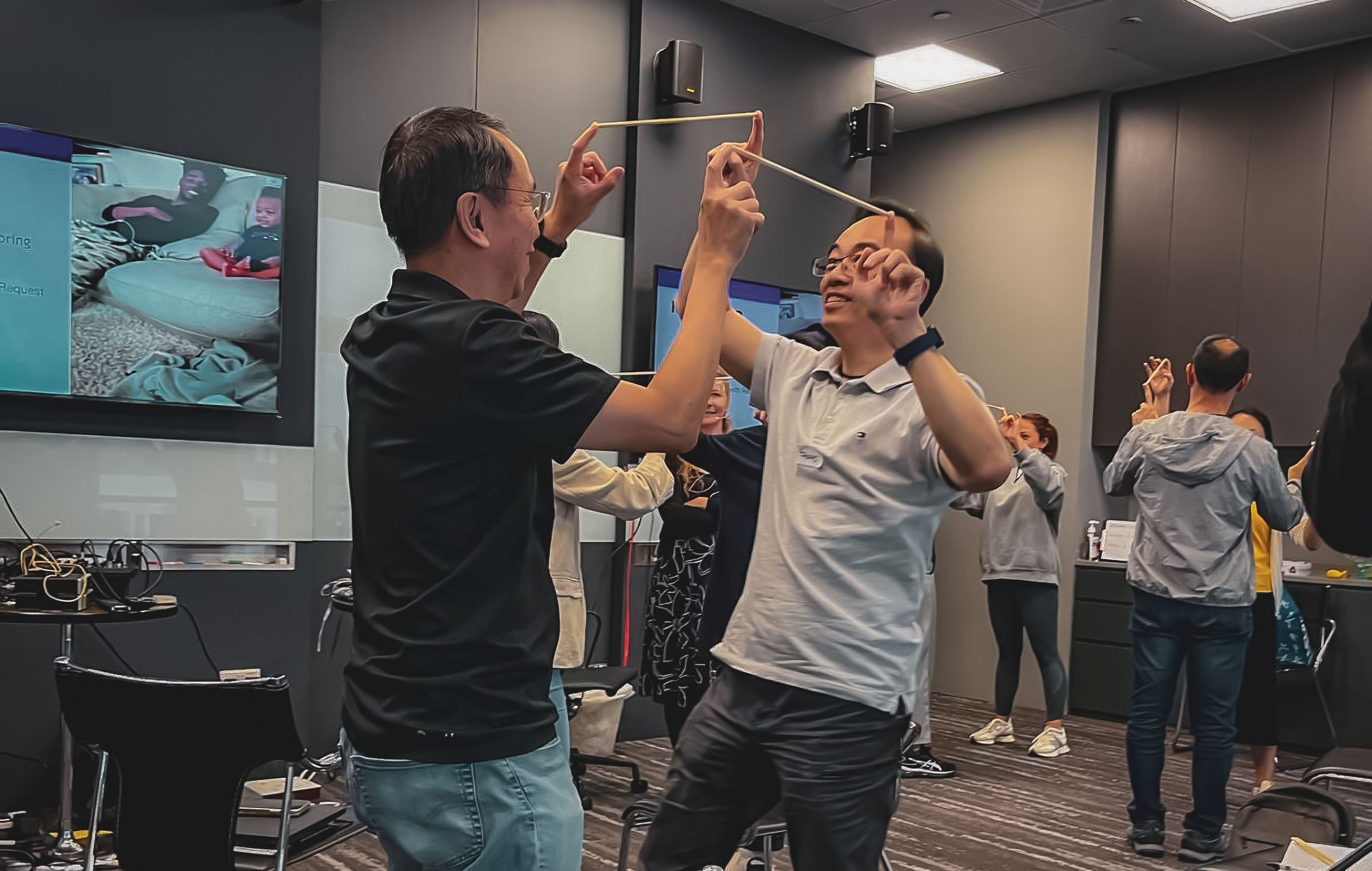 Individuals participating at a live Dr. Abi Blakeslee Demonstration