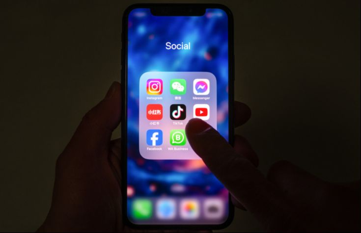 Mobile phone screen with social media app icons