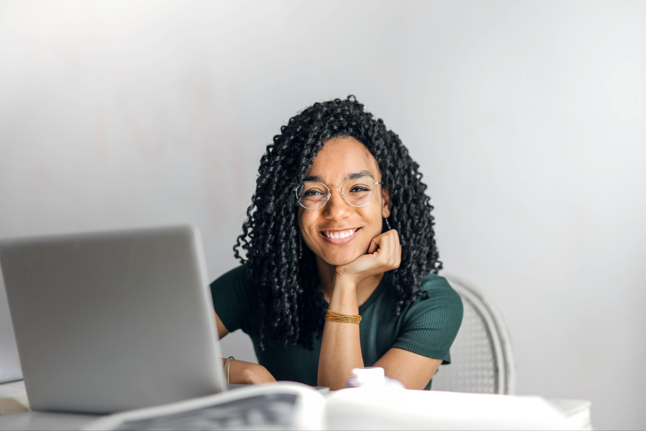 woman happy at desk