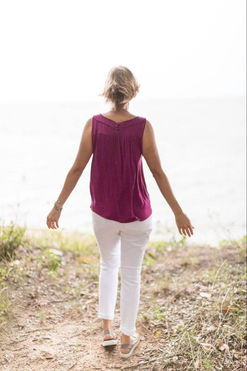 Standing by a lake feeling relaxed