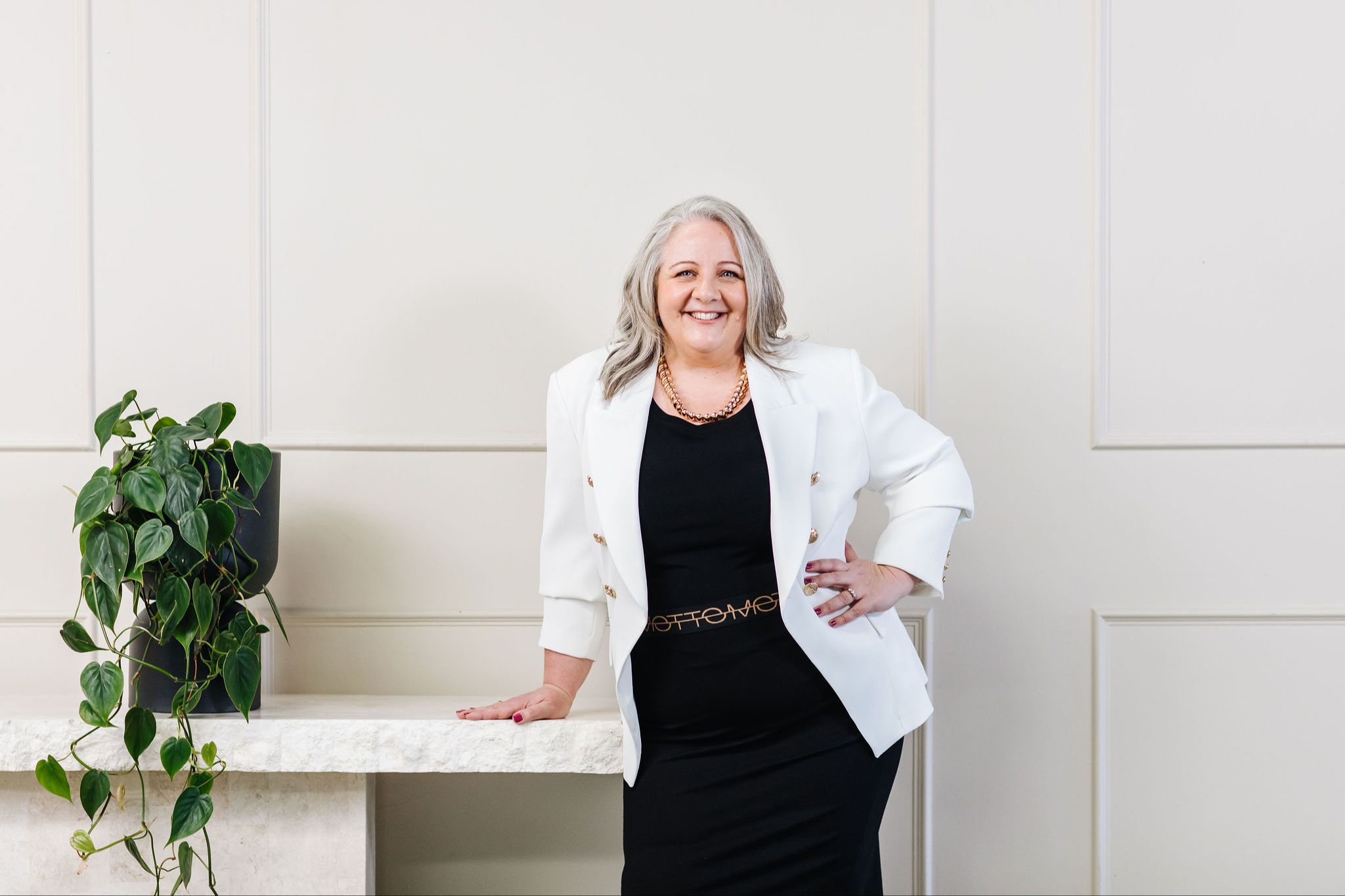 Nicki Kuurman smiling softly, founder of The Practical Mystic.