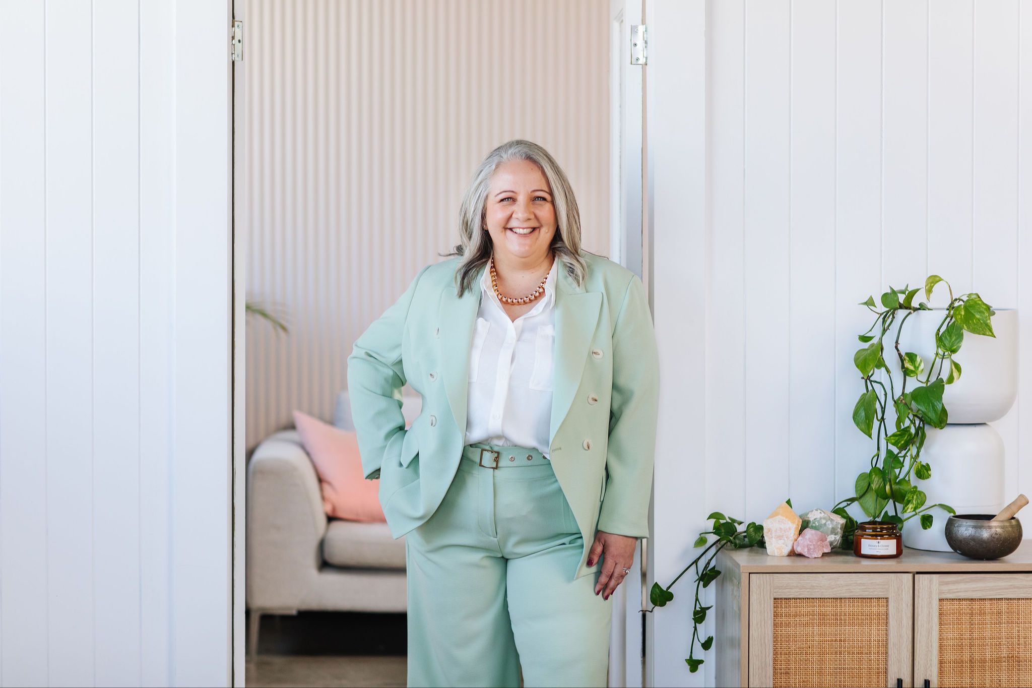 Nicki Kuurman smiling softly, founder of The Practical Mystic.