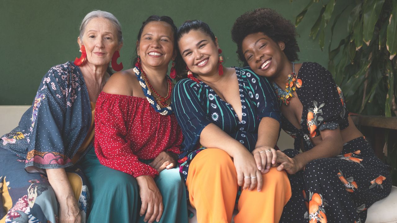 Women gathering in supportive community and connection