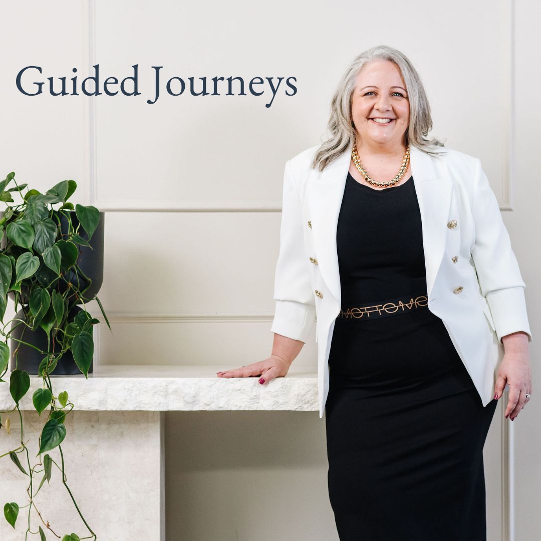 Nicki Kuurman standing in hallway inviting you on a Guided Journey coaching program